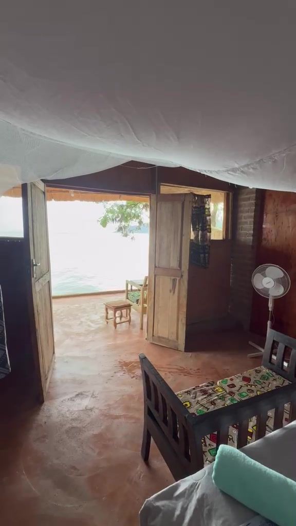 View from the Lake View Room (Ngoni) out to its veranda and the lake at Anake Lodge, Cape Maclear – photo 14 of 14
