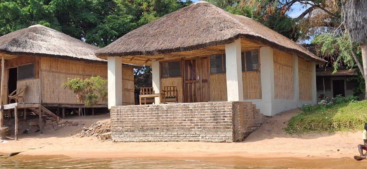 Lake View Room (Ngoni) chalet on the beach, seen from the lake at Anake Lodge, Cape Maclear – photo 9 of 14
